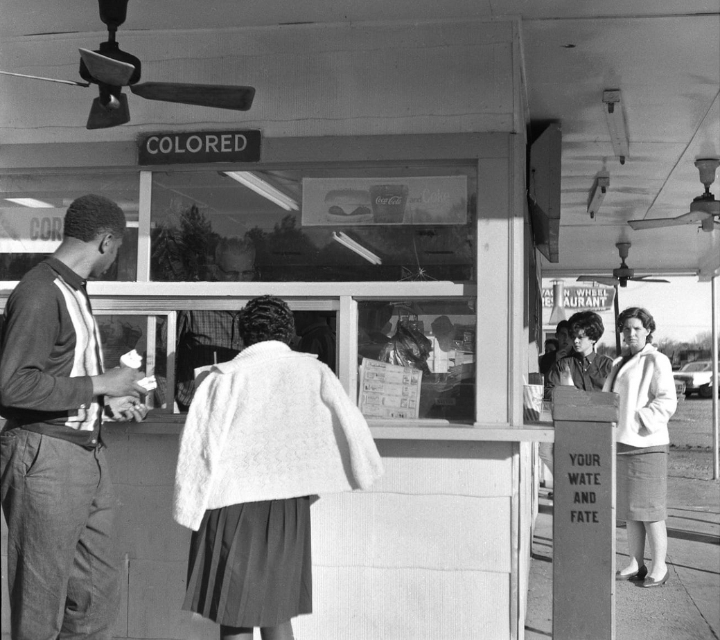 Black people ordered from a different window than white people at a burger stand in Mississippi.